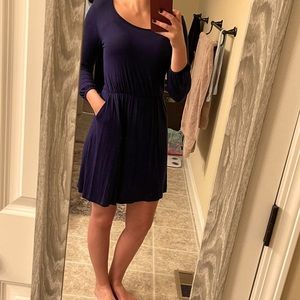 Navy dress with 3/4 sleeve and waist cinch